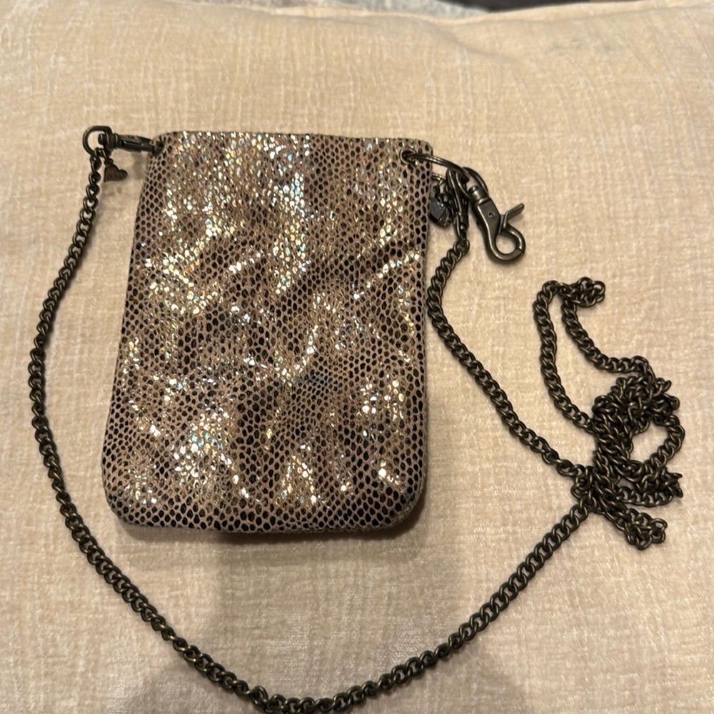 small purse with chain strap 
strap can be detached